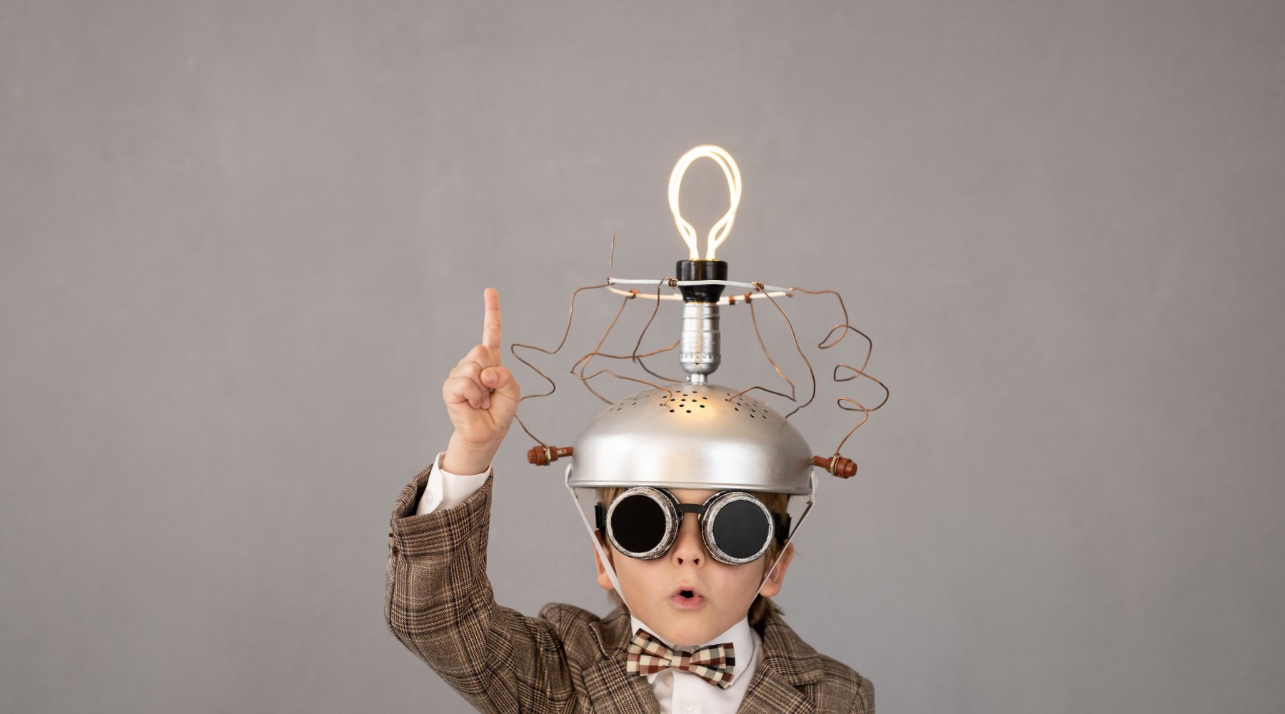 Image: Supplied Smart Child Wearing Funny Helmet with Illuminated Lightbulb