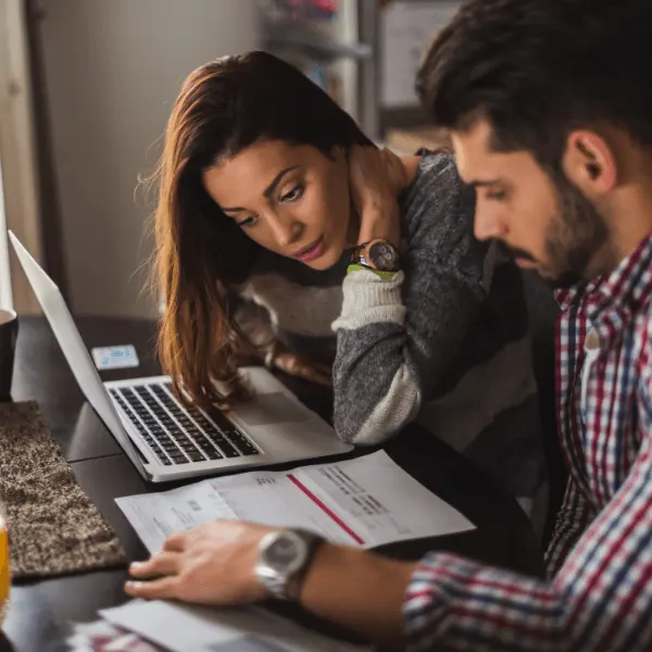 Couple looking at bills