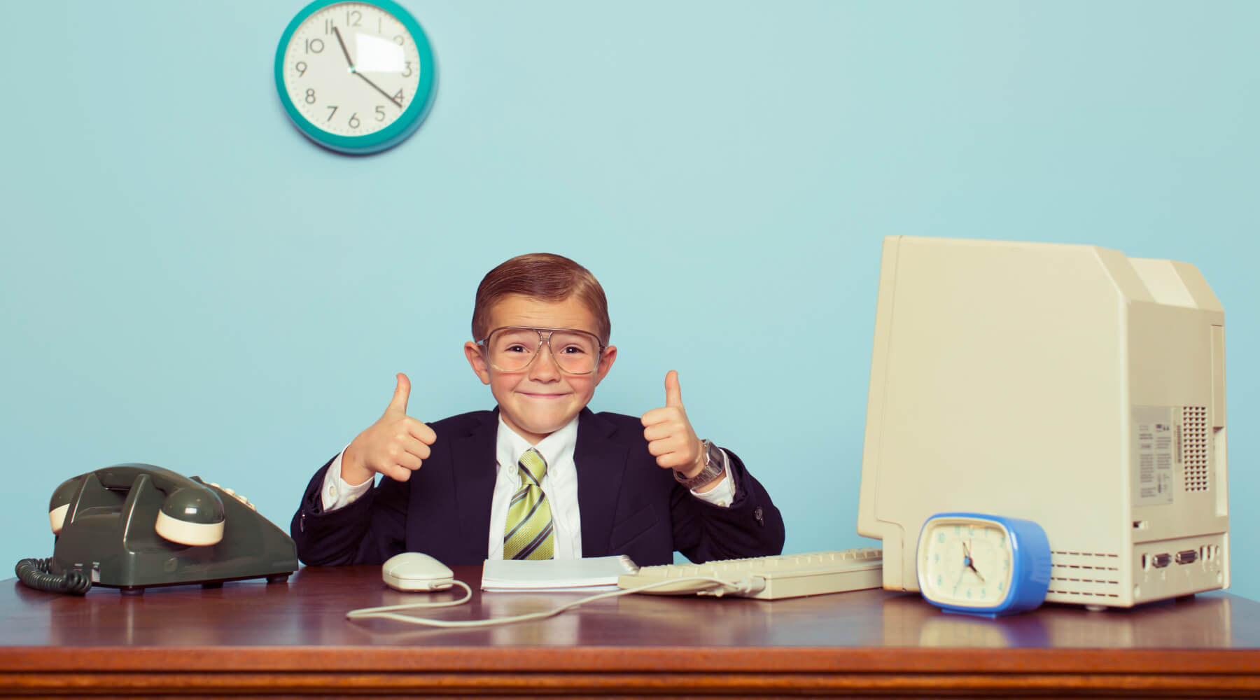 Image: Getty Images Happy kid using a computer